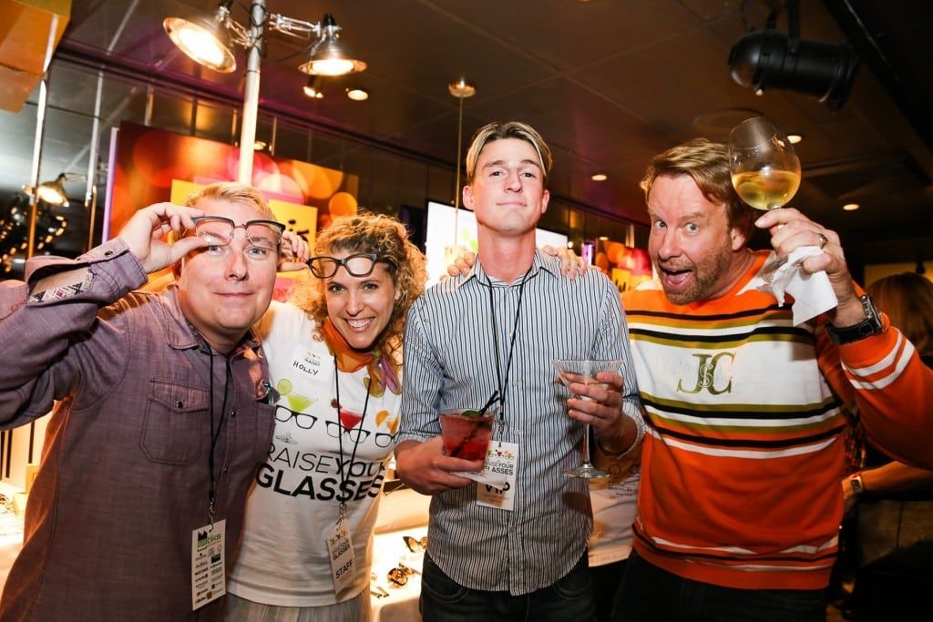 4 people enjoying 2015 Raise Your Glasses event at Martinis Above Fourth