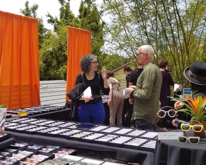 2 people chatting outside at Urban Optiks Optometry 2019 Raise Your Glasses Event
