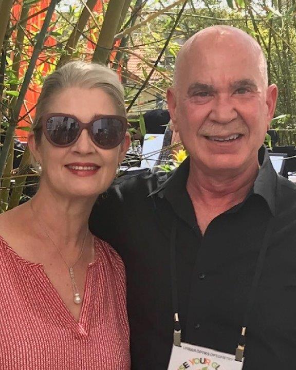 Guest and Dr Klein posing at Raise Your Glasses 2019 Event
