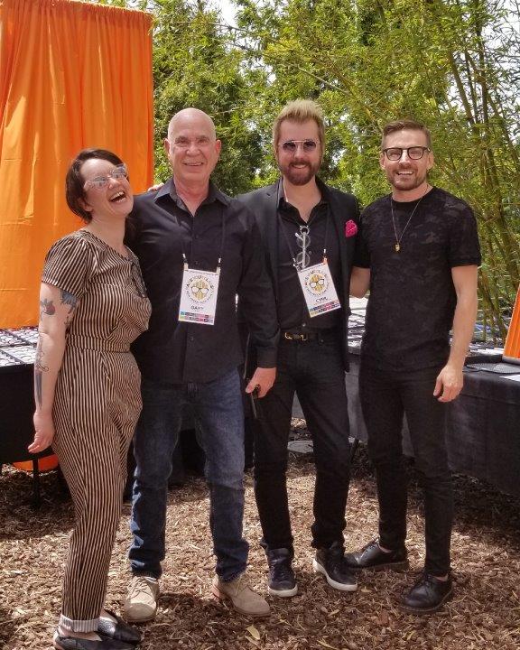 4 people posing for camera at Urban Optiks Optometry  2019 Raise Your Glasses Event