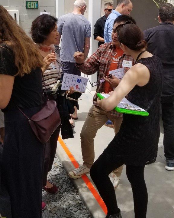 Person taking an order for frames at Raise Your Glasses 2019 Event
