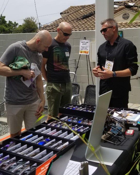 2 guests and a vendor chatting at Raise Your Glasses 2019 Event
