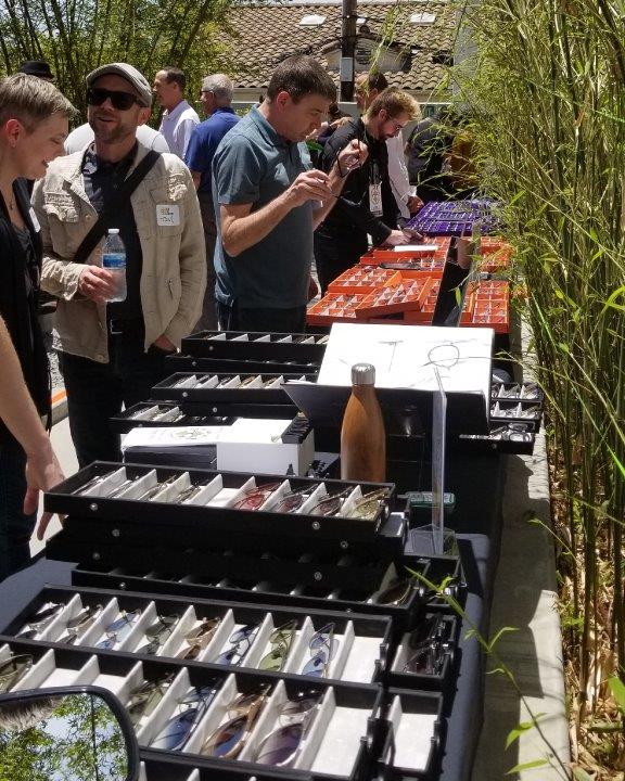 Many people enjoying outdoor shopping at Raise Your Glasses 2019 Event