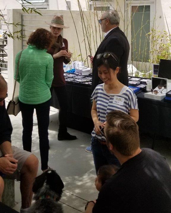 Shoppers standing outside chatting at Raise Your Glasses 2019 Event