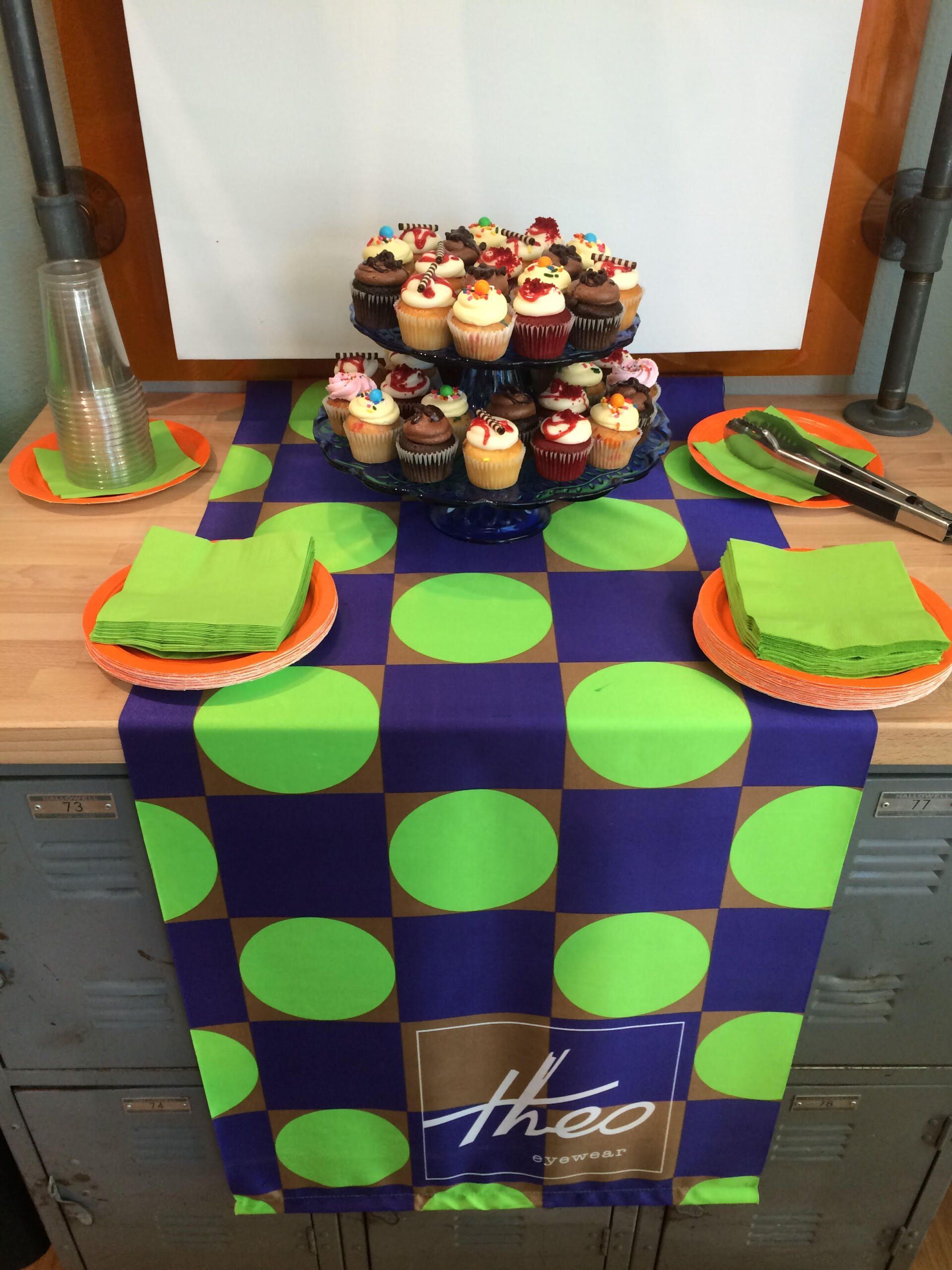 Colorful tablecloth and cupcakes at 2016 Theo Trunk Show Event