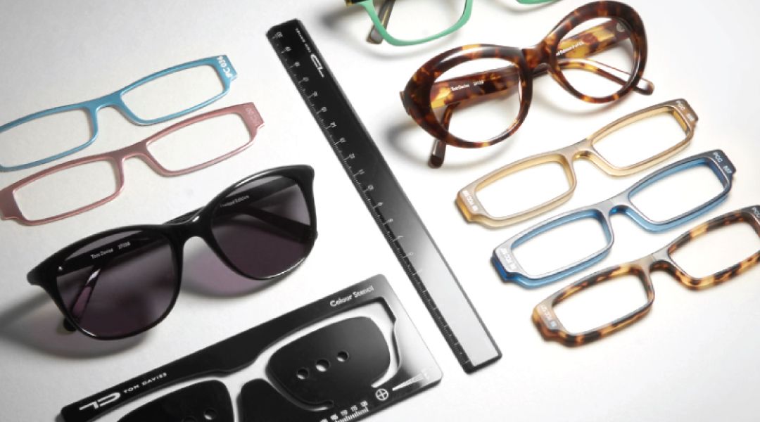 Various tools, frame shape and color sampels used in custom eyewear