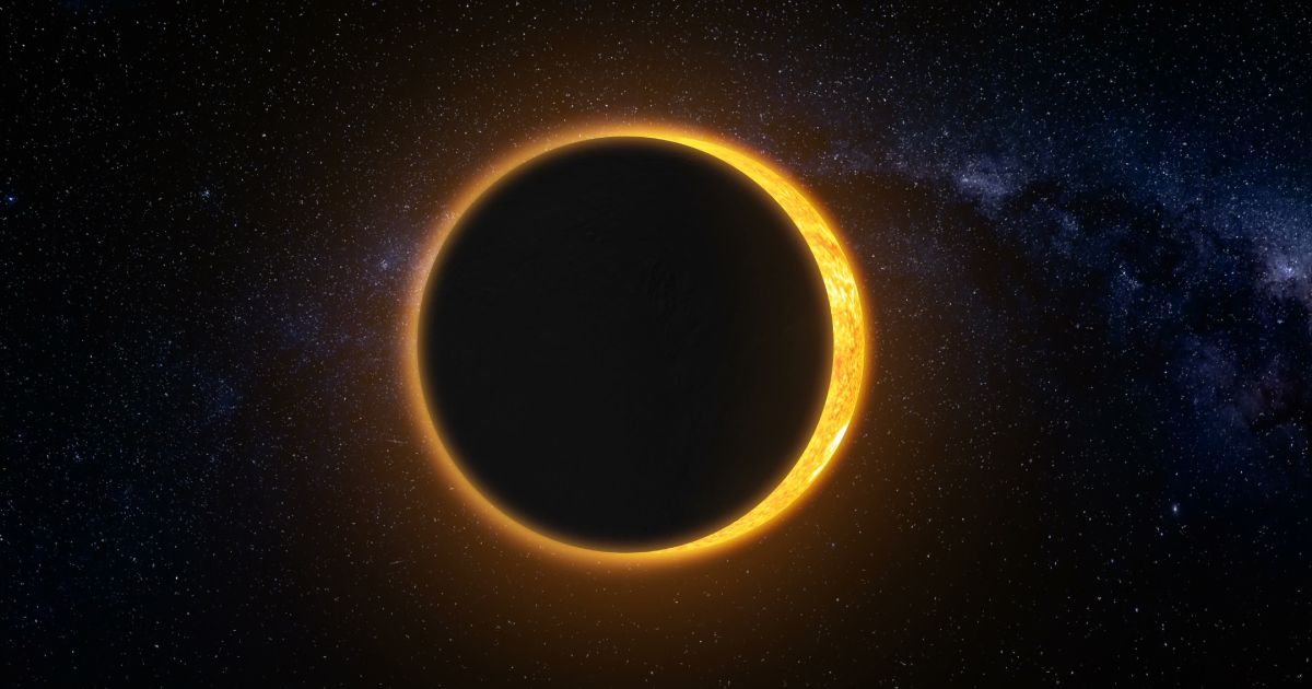 A partial eclipse of the sun in the night sky