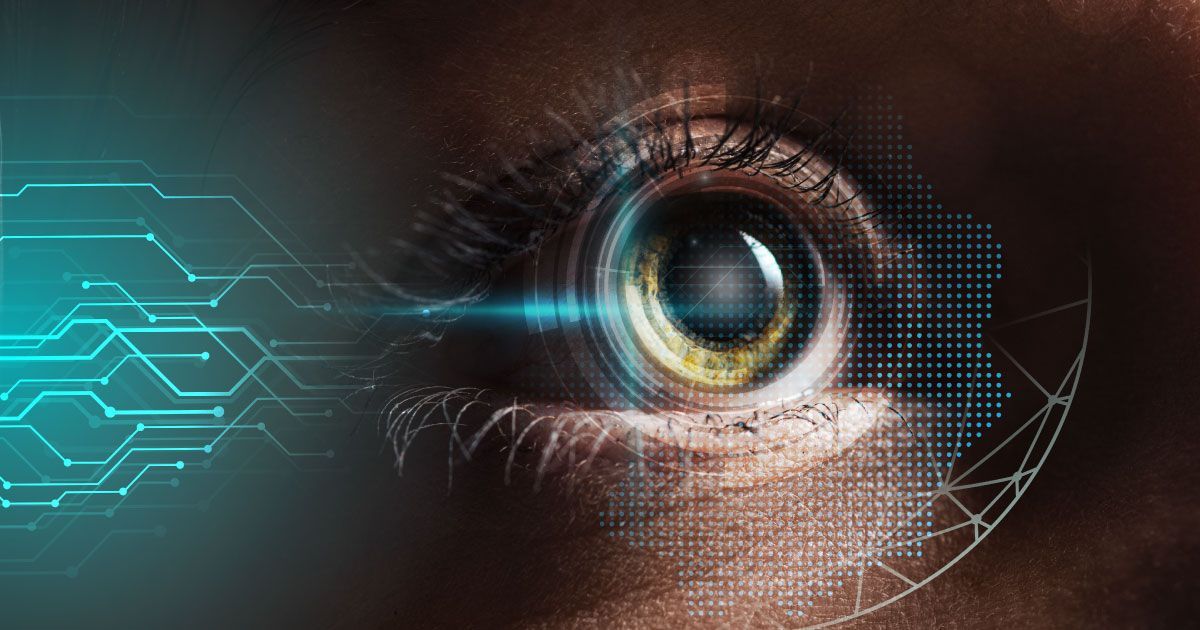 A close up of a person 's eye with a robotic illustration overlay.