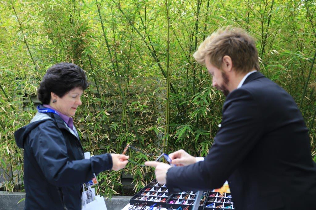 Vendor talking to customer at Raise Your Glasses 2017 Event