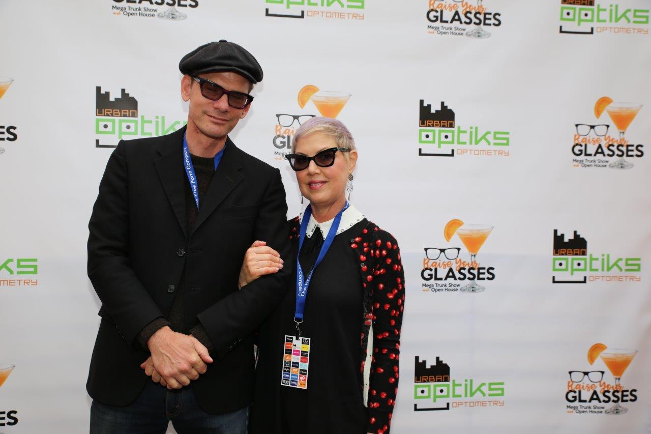 2 people in sunglasses posing at Raise Your Glasses 2017 Event