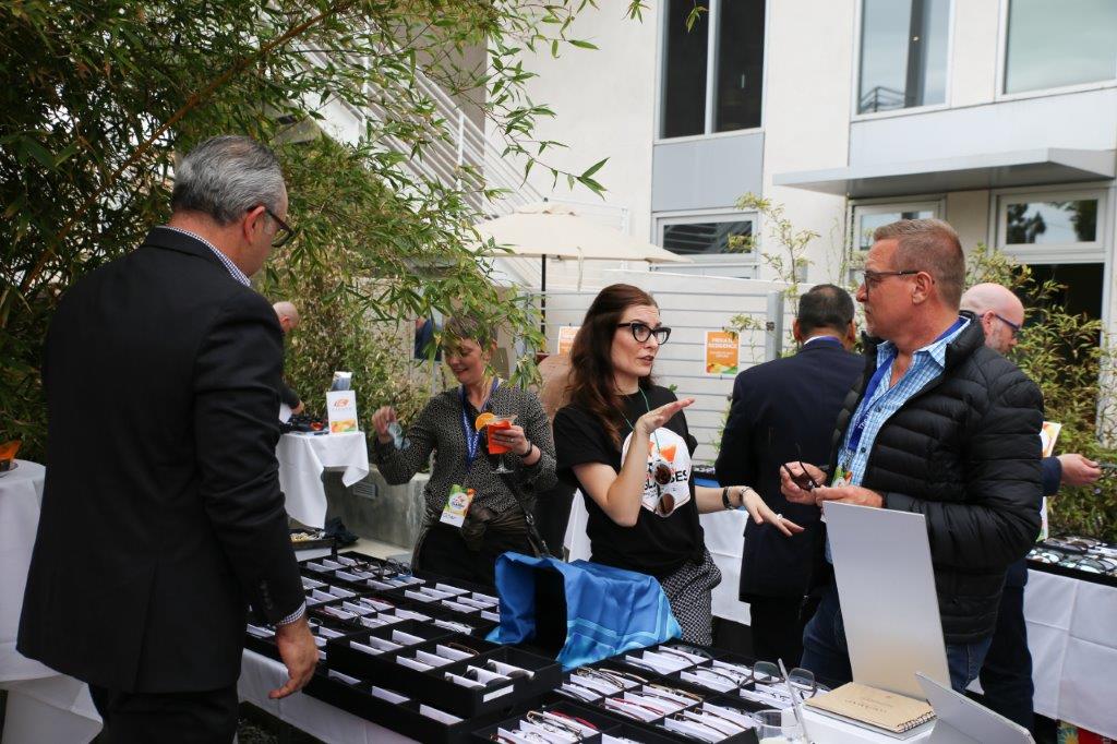 People at vendor table at Raise Your Glasses 2017 Event