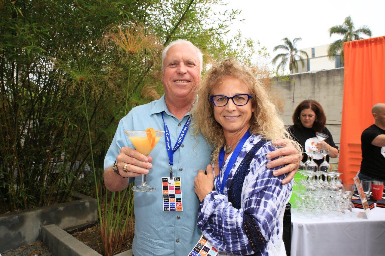 Two people posing for camera at Raise Your Glasses 2017 Event