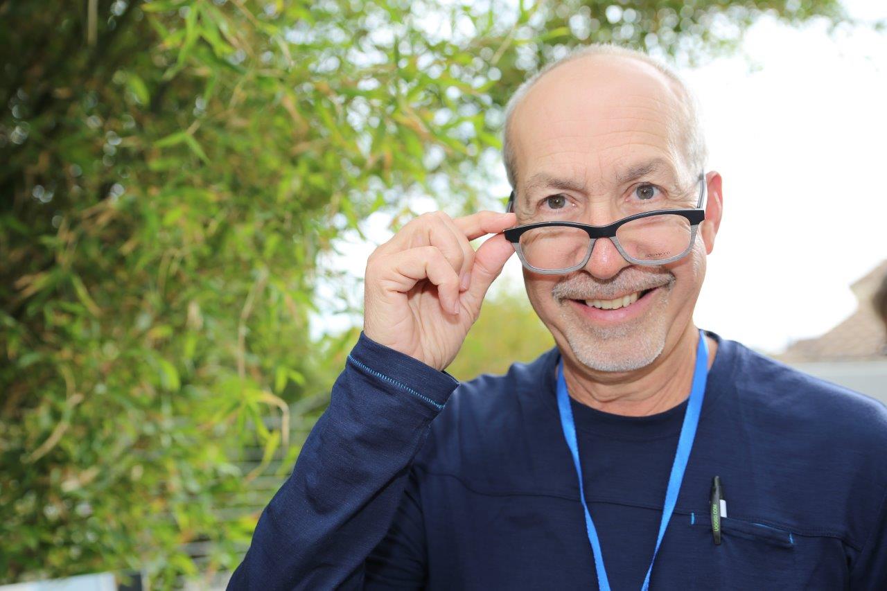 Person wearing glasses and posing at Raise Your Glasses 2017 Event