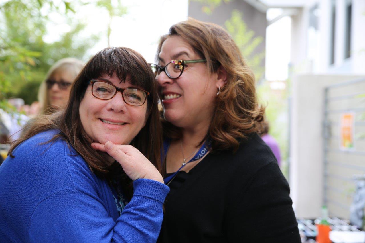 2 people posing for camera at Raise Your Glasses 2017