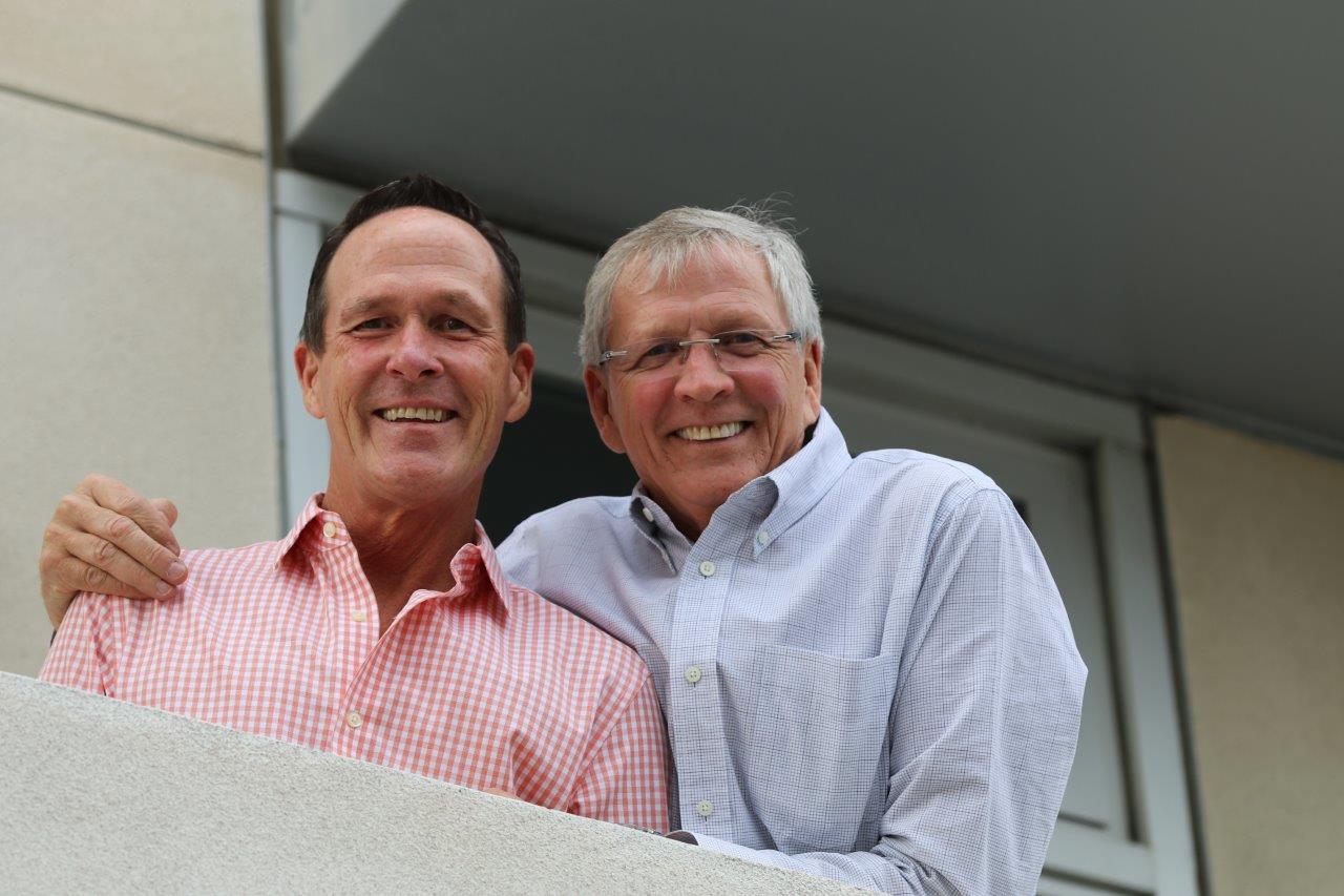 2 people smiling and posing at Raise Your Glasses 2017 Event