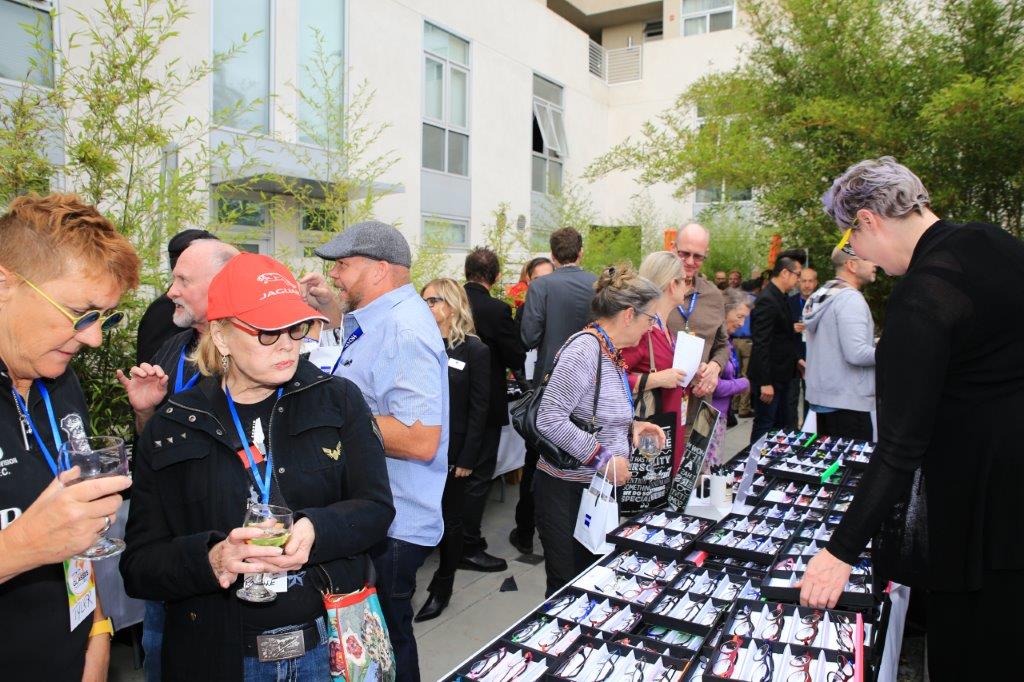 People viewing frameline displays at Raise Your Glasses 2017 event