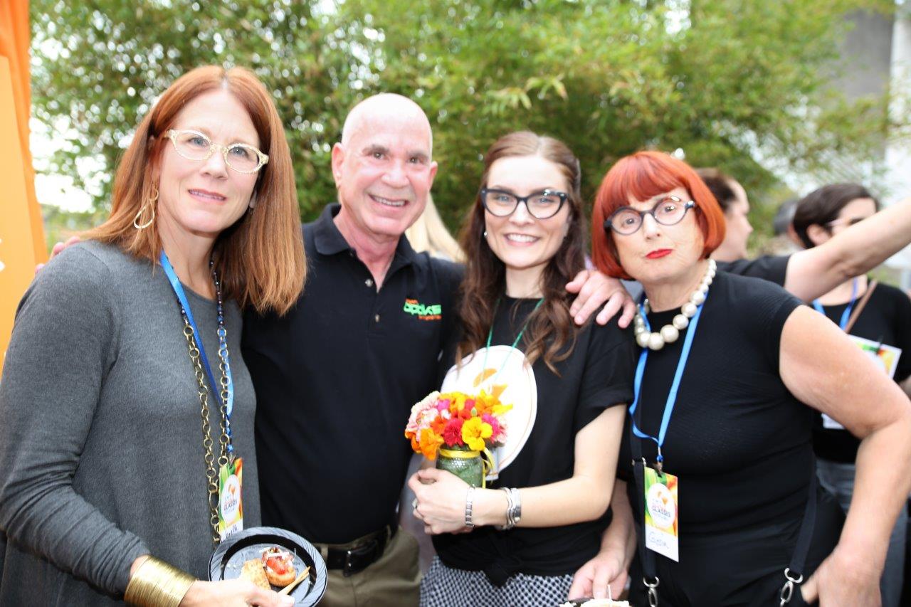 4 people enjoying  Raise Your Glasses 2017 event