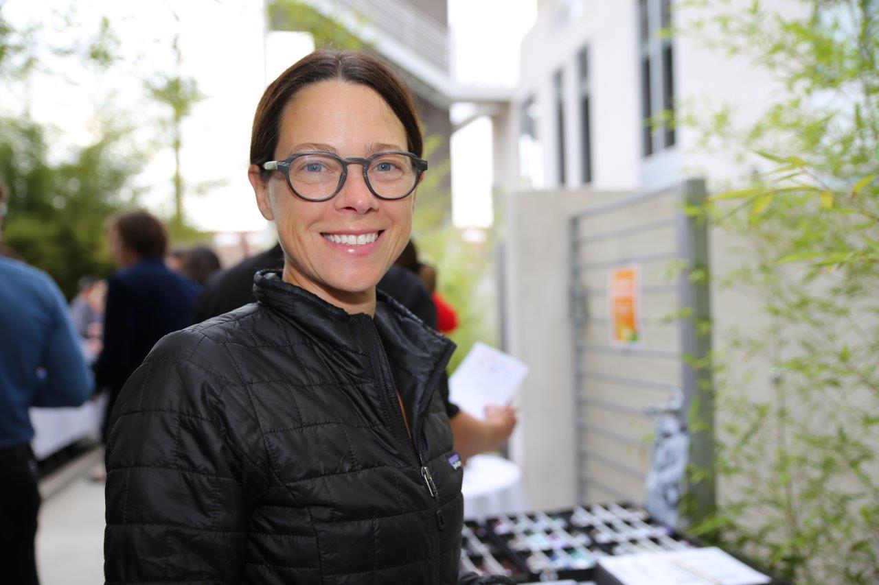 Smiling person modeling colorful glasses at Raise Your Glasses 2017