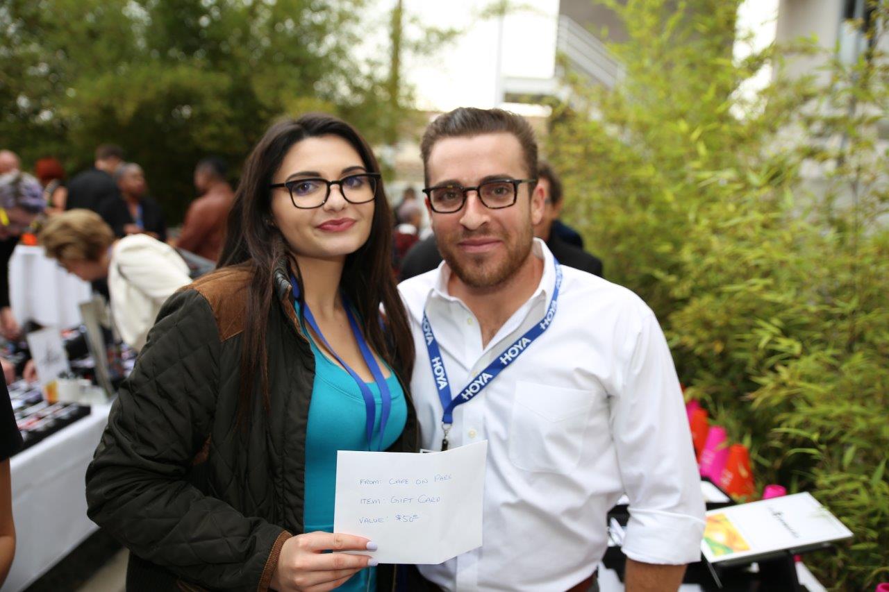 2 people enjoying Raise Your Glasses 2017 Event