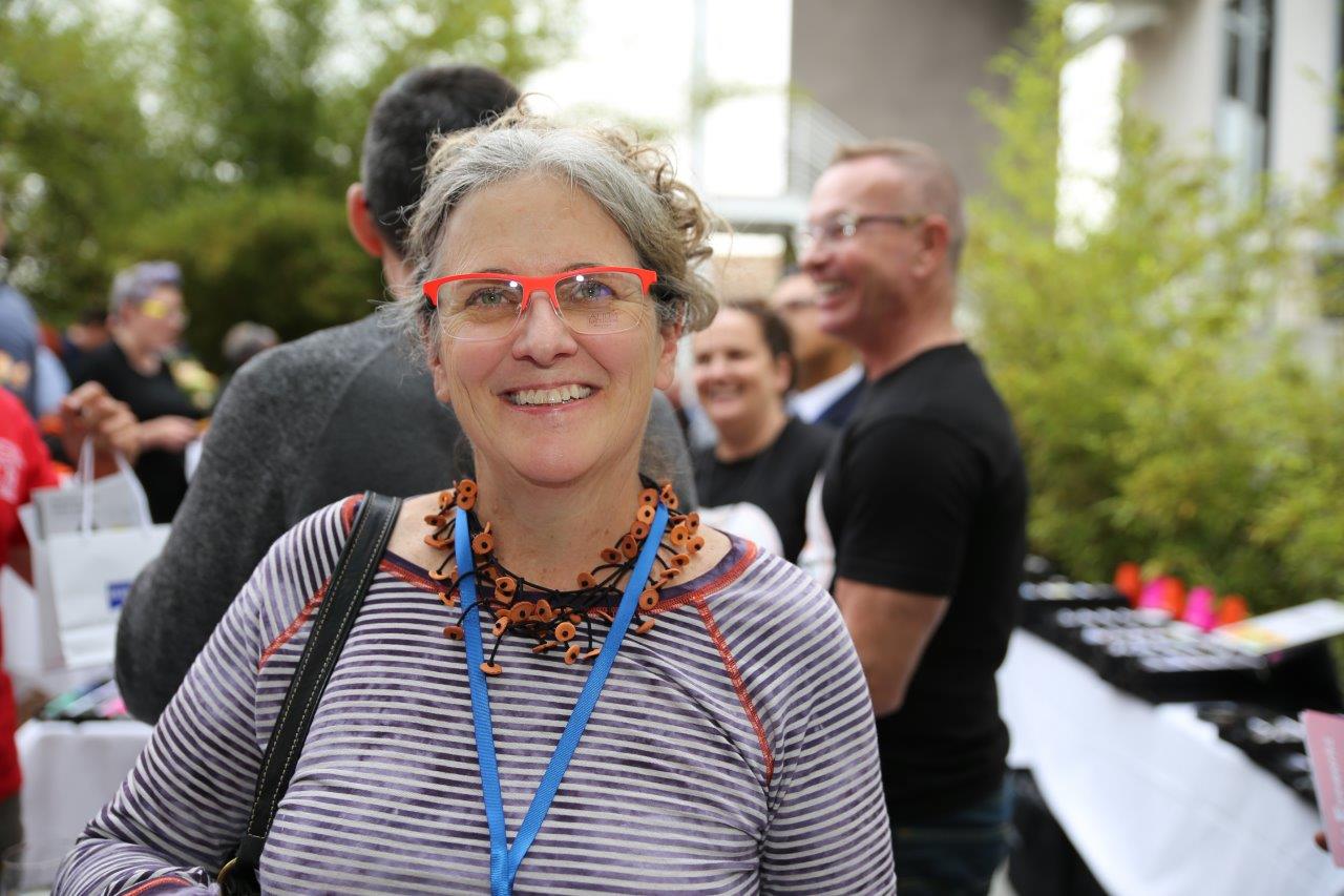 Person in colorful frames at Raise Your Glasses 2017 Event