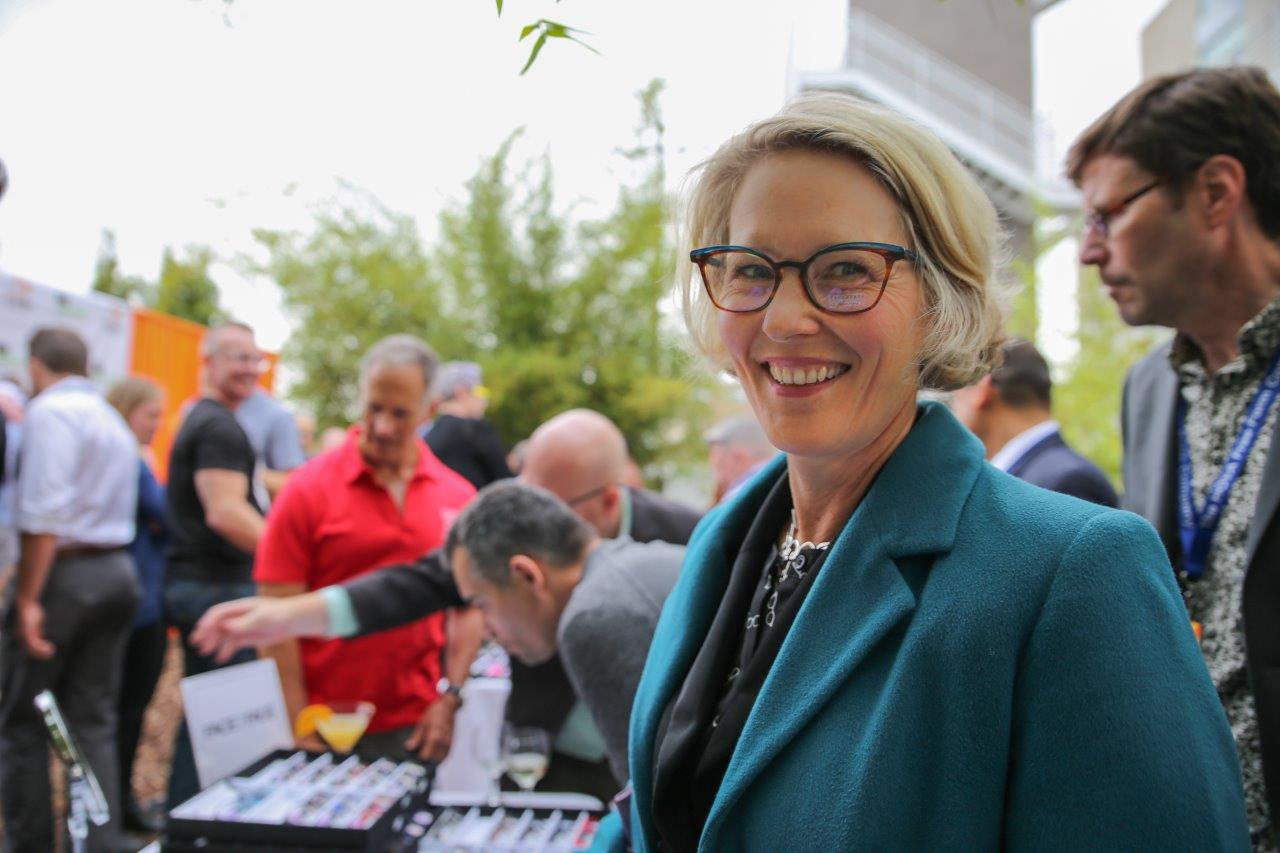 Person smiling at Raise Your Glasses 2017 Event