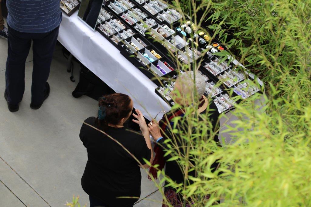 2 people shopping framelines at Raise Your Glasses 2017 Event
