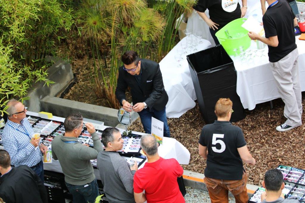 People looking at framelines  at Raise Your Glasses 2017 Event