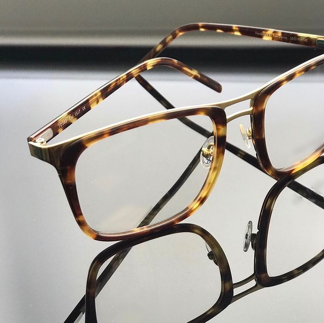 Tortoise frame with temples slightly folded in