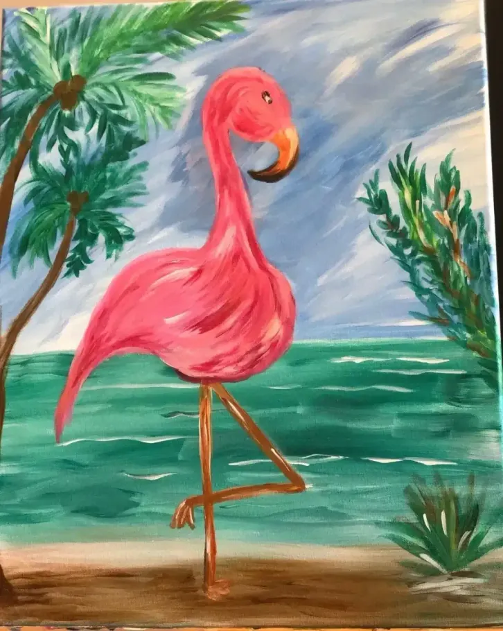 Pink flamingo standing on one leg by a tropical beach with palm trees and green water