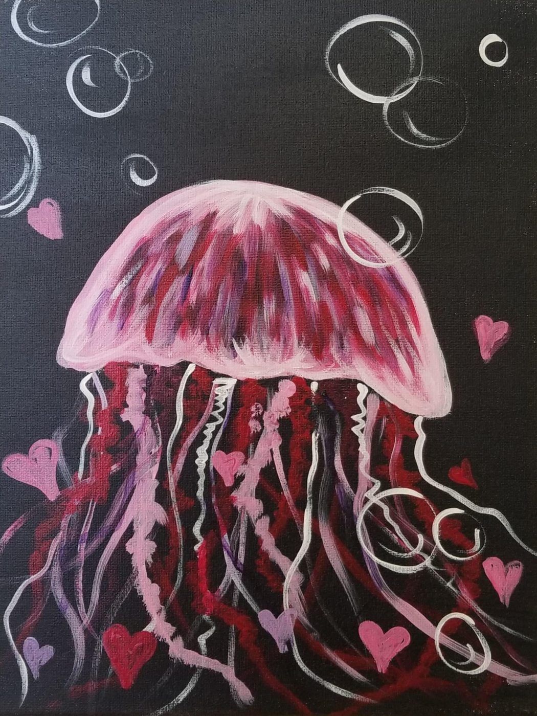Pink jellyfish painting on a black background with floating bubbles and small hearts