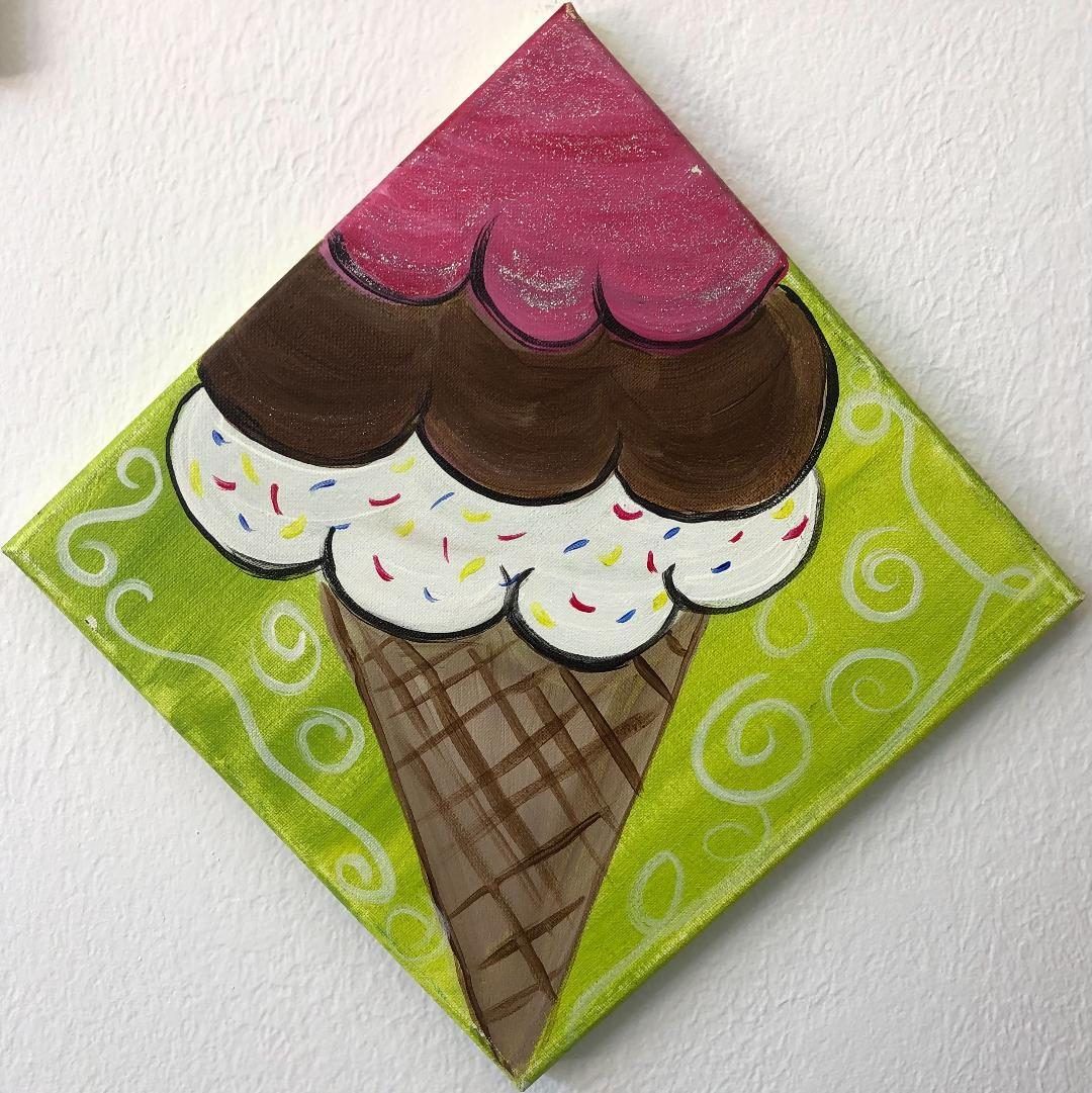 Ice cream cone drawing on a green diamond background with pink, brown, and white scoops.
