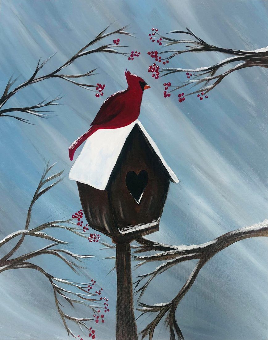 Red bird perched on a birdhouse with a heart cutout, against a blue snowy background.