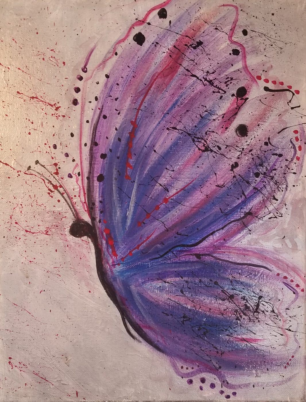 Abstract purple and pink butterfly wing painted on a beige background with ink splatters