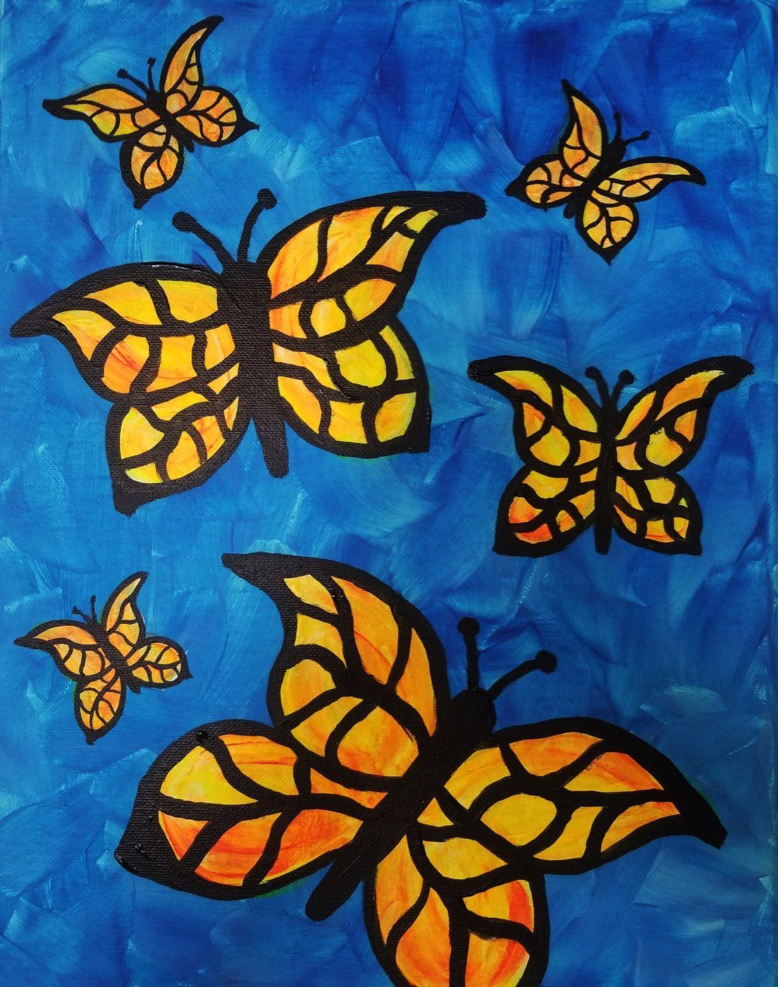 Five orange-and-black butterflies on a textured blue background