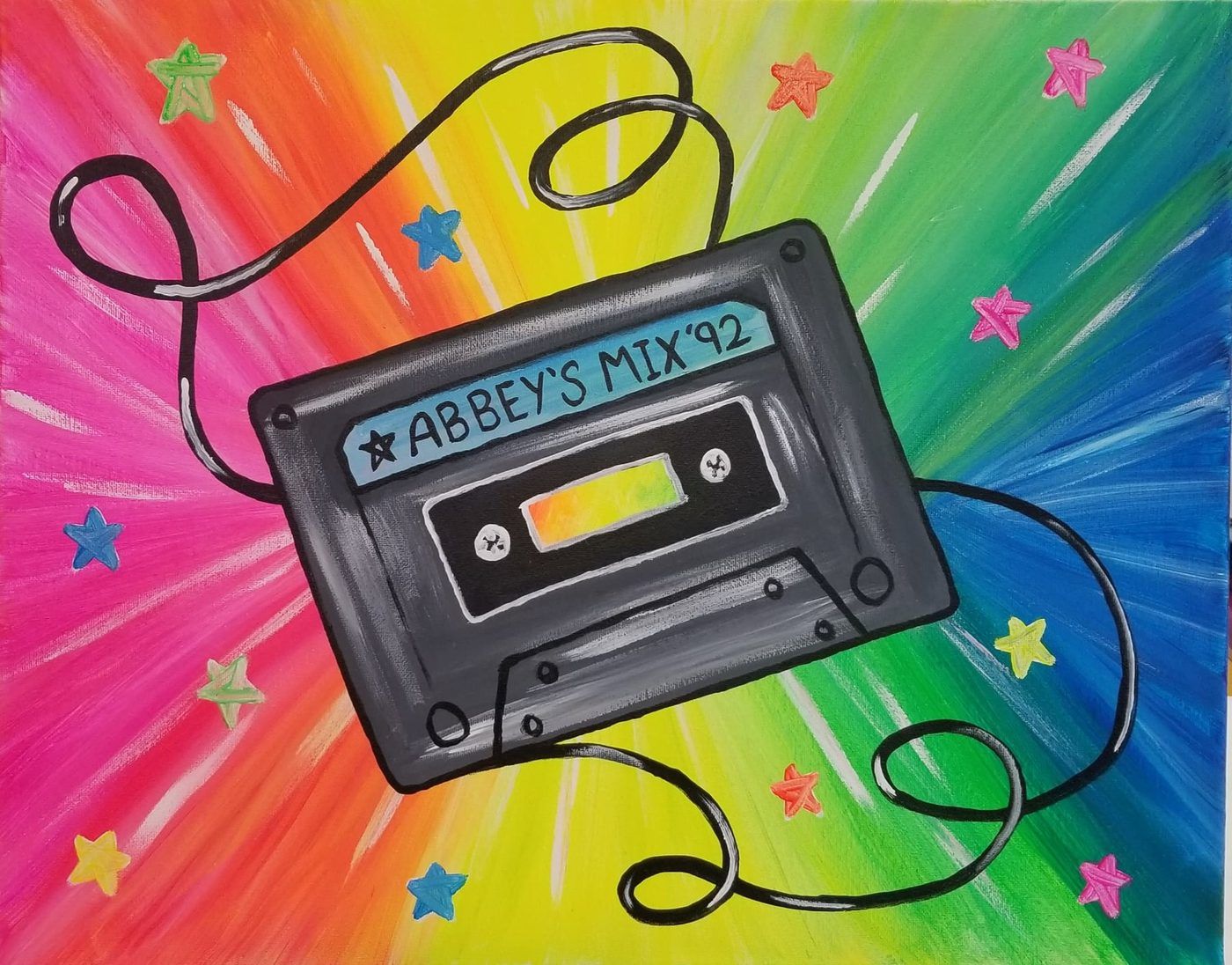 Colorful rainbow background with stars and a black cassette tape labeled “ABBEY’S MIX ’92” swirling on a cord