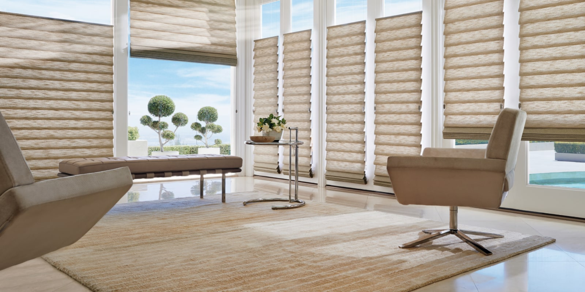Hunter Douglas Roman shades with the Top-Down/Bottom-Up system on windows in a home