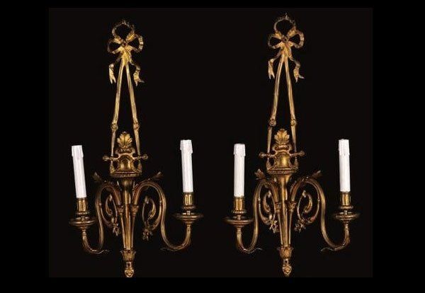 Appliques in bronzo dorato. Quattro appliques a due luci Napoleone III