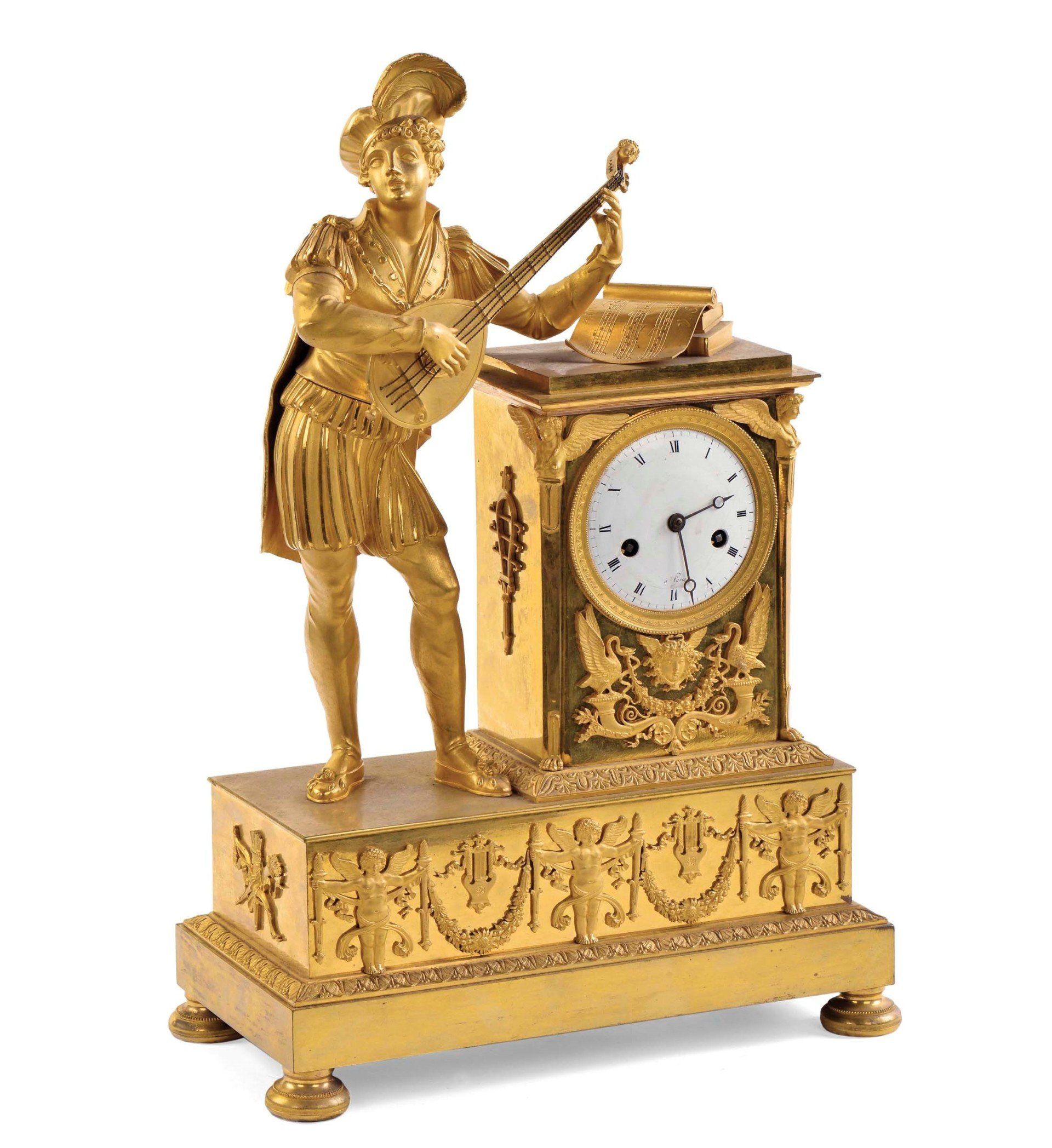 Pendola da tavolo Impero in bronzo dorato al mercurio raffigurante menestrello, Francia inizio XIX secolo