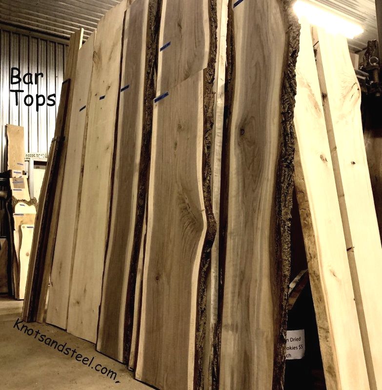 Live edge lumber bar tops for sale at our location.