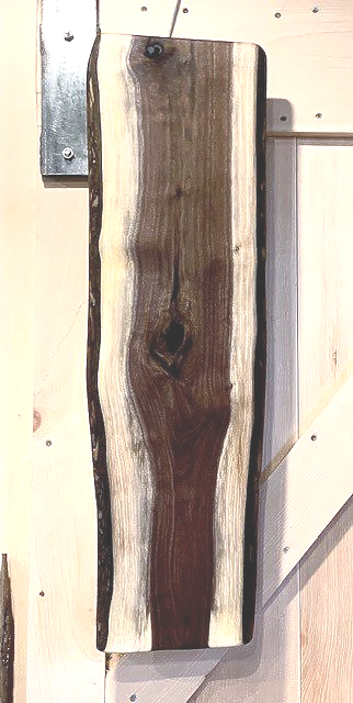 Charcuterie board from Kawartha Lakes. Kawartha lakes Black Walnut large charcuterie board with live rustic edge.