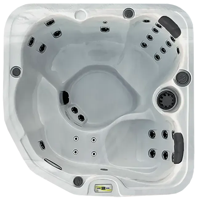 An overhead view of a light gray, square hot tub with rounded corners, multiple molded seats, and various jet placements.