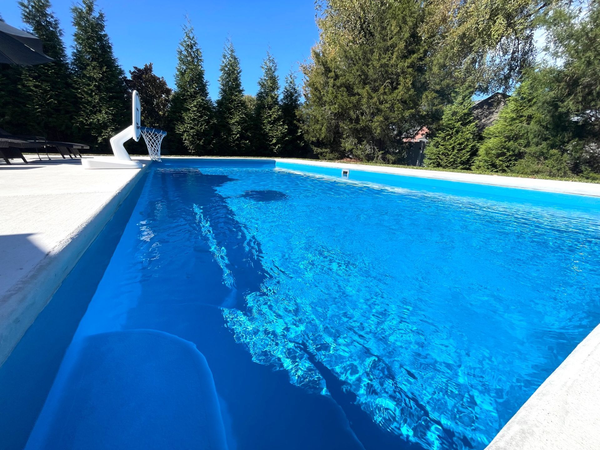 Close-up of crystal clear water in Goliath 16x33 backyard pool in Smyrna TN