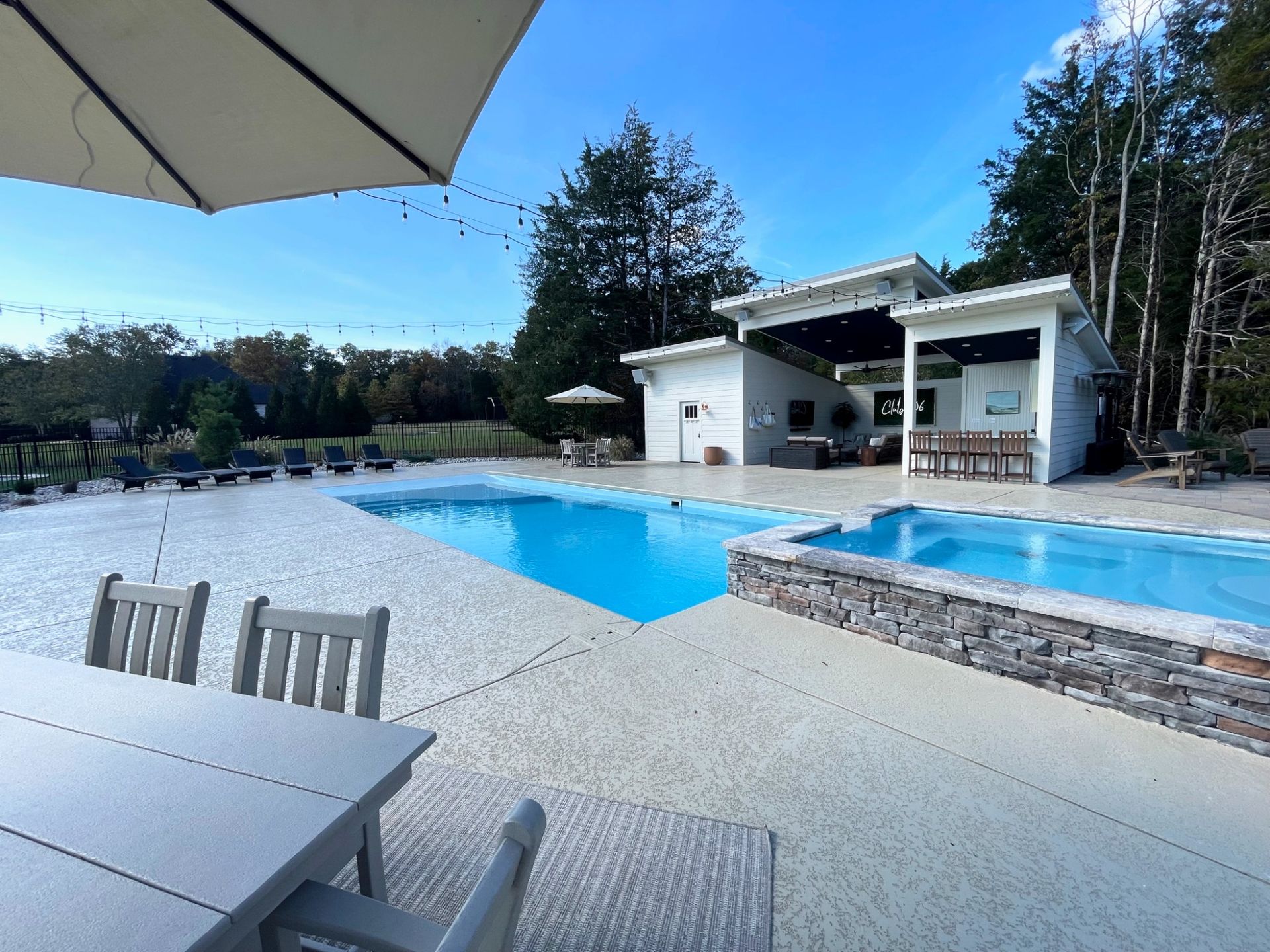 Waterfall spillover from spa into Grace beach entry pool in Murfreesboro TN