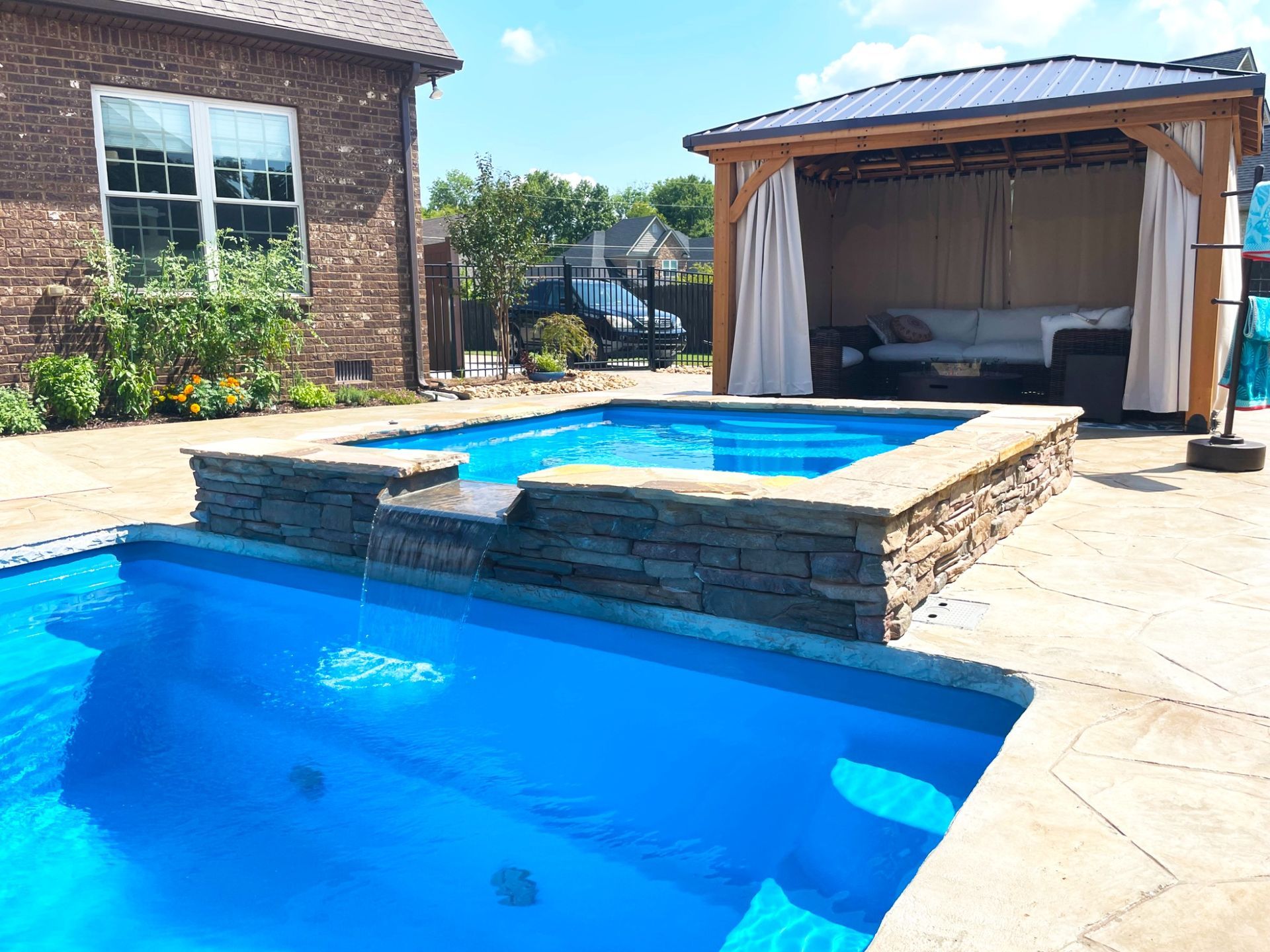 Close-up of 9ft spa waterfall spillover into Aspen pool in Murfreesboro TN