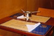 Foto de aquecimento do molho na mesa