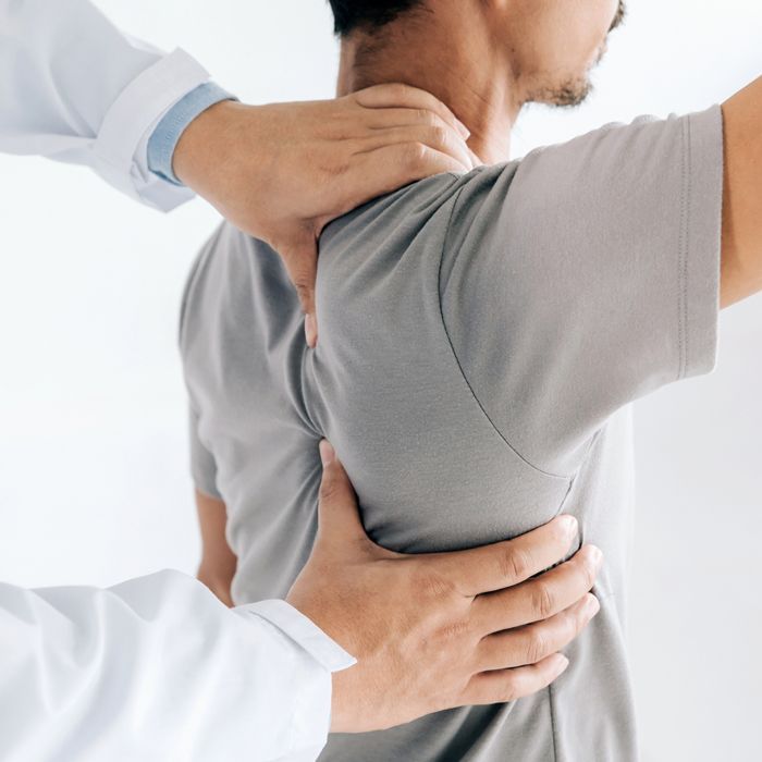Chiropractor Dealing with Patient's Back — Toowoomba & Roma, QLD — Brownlie Chiropractic Chiropractor Dealing with Patient's Back — Toowoomba & Roma, QLD — Brownlie Chiropractic