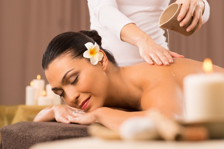 Woman Having A Back Oil Massage