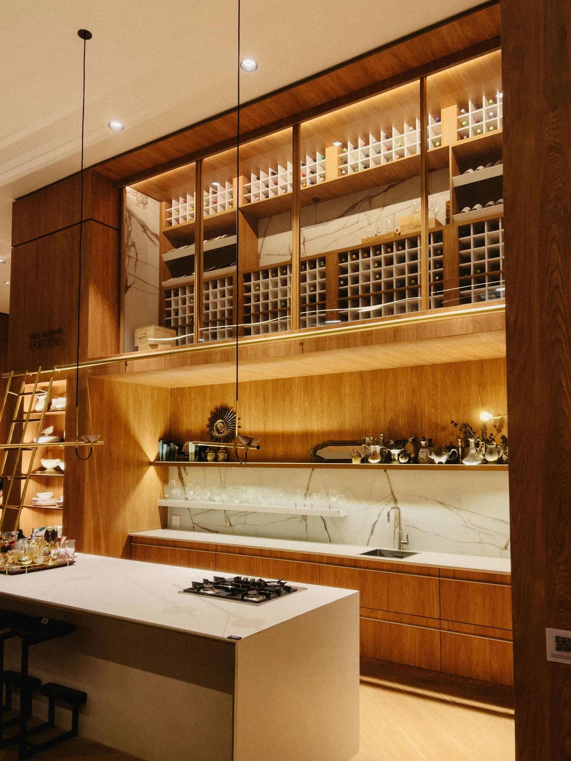 A kitchen with wooden cabinets and a stove top oven