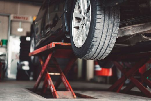Car Lifting — Chicopee, MA — Geno's Auto Service Inc. Car Lifting — Chicopee, MA — Geno's Auto Service Inc.