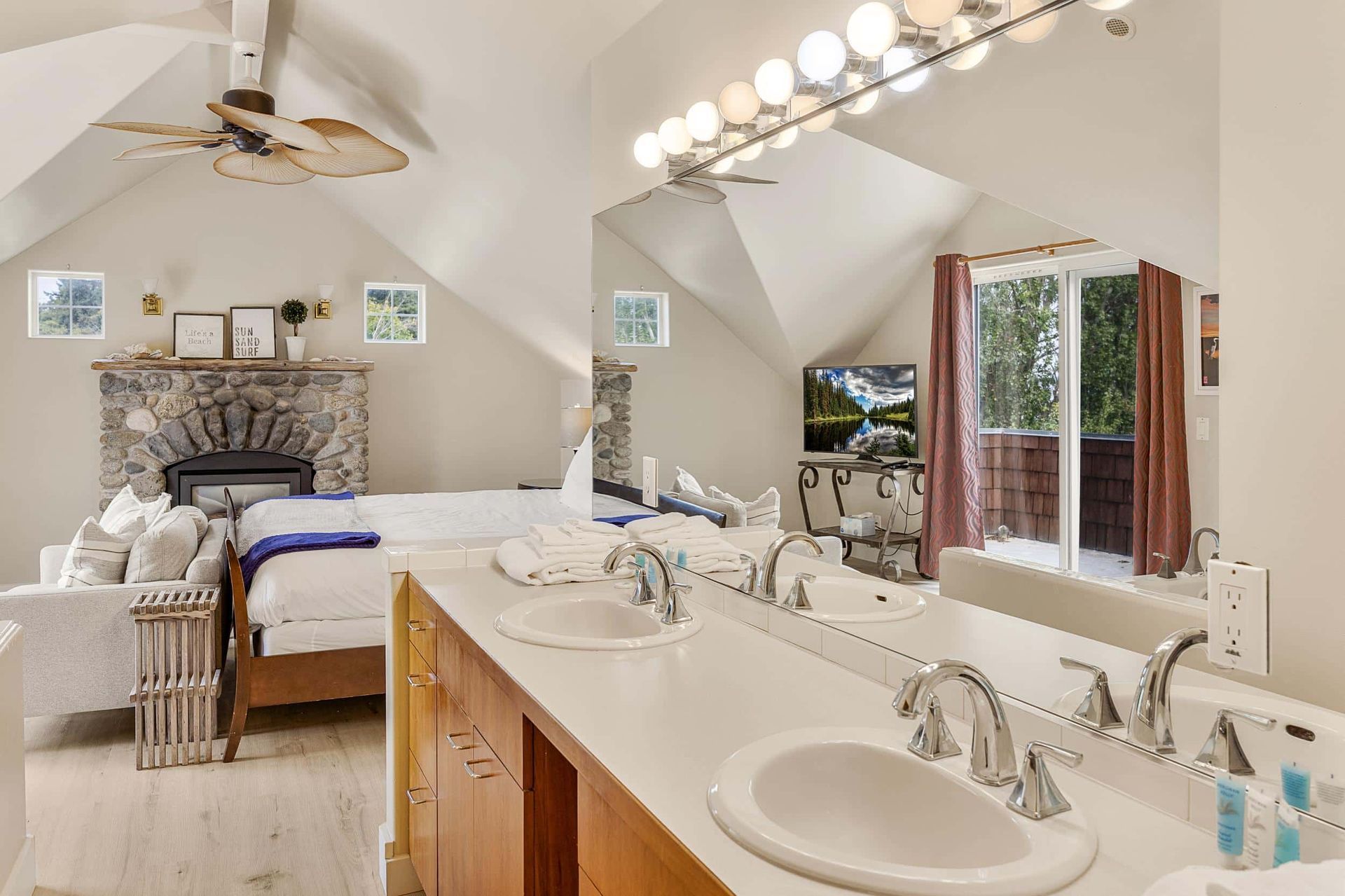 A bathroom with a jacuzzi tub and two sinks